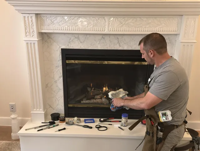 Miami Gardens Chimney Sweep performing fireplace maintenance in Miami Gardens, FL